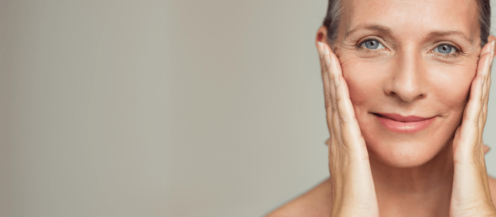 senior woman touching her perfect skin